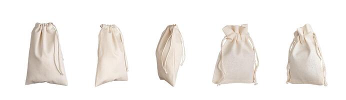 Textile bags set, eco sack with strings, mockup. Natural fabric sack isolated on white photo