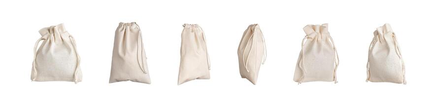 Textile bags with strings set, pack mockup. Natural eco fabric linen sack isolated on white photo