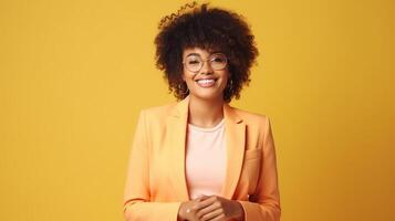 AI generated Full body happy cheerful Afro American woman wearing a stylish  peach suit and trendy glasses standing isolated on a yellow background, looking at camera, winking her eye and smiling photo