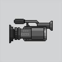 Pixel art illustration Movie Camera. Pixelated Movie Camera. Movie Camera pixelated for the pixel art game and icon for website and video game. old school retro. vector