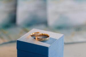 Designer wedding rings lying on the surface. Two wedding rings photo