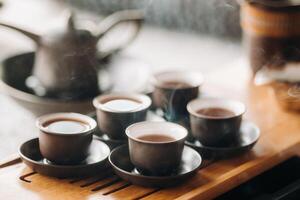 Preparing for a tea ceremony with a large company photo