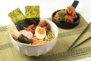 Ramen with Boiled Egg, Nori, Kamaboko, and Mushroom photo