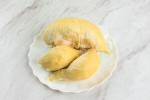 Peeled Durian on White Plate photo
