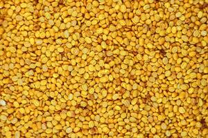 Fried mung bean background. Top view of yellow mung bean texture. photo