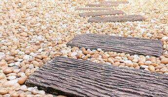 Walk way on gravel stone floor photo