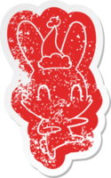 cute quirky cartoon distressed sticker of a rabbit dancing wearing santa hat png