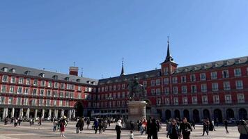12 March 2024 - Madrid, Spain - Crowds of Tourists on Plaza Mayor in Madrid, Spain - Spring Day video