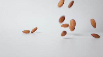 Slow motion nut almond on white background video