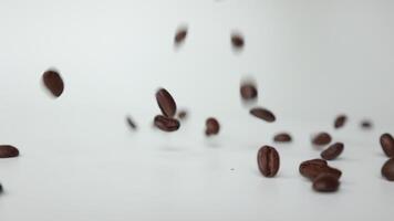 Coffee on white background, slow motion of coffee beans video