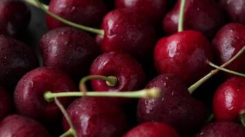 Cereza fruta, Cereza fondo, maduro Cereza fruta, rojo cereza, de cerca de cerezas con gotas agua video