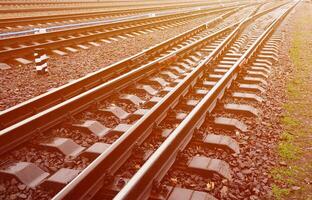 Photo fragment of the railroad tracks in the rainy weather