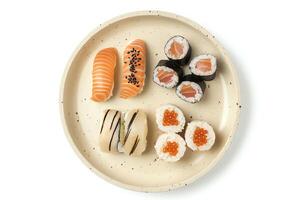AI generated Sushi served on a plate isolated on a white background photo