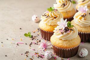 AI generated Easter cupcakes festive Easter dessert, decorated with mini eggs, spring flowers, space for text photo