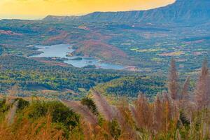 The stunning view in Forest Park from a tourist's standpoint with background of golden sky, swamps and mountains, Rainforest, Thailand. Bird's eye view. Aerial view. photo