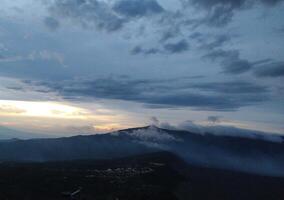 Sunrise view from the peak of Mount Bromo photo