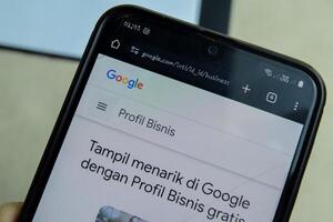 Google Business application on Smartphone screen. Google Business is a freeware web browser developed by Google LLC. Bekasi, Indonesia, March 2, 2024 photo