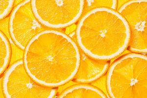 Colorful orange fruit slices photo