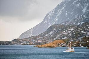 Fishing ship in fjord in Norway photo