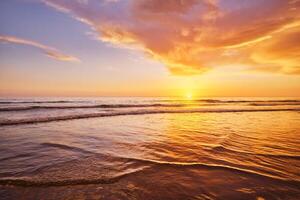 Atlantic ocean sunset with surging waves at Fonte da Telha beach, Portugal photo