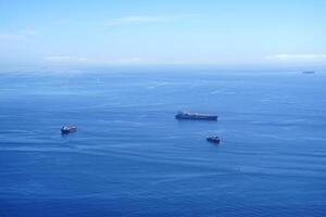 Ships in the immensity of the ocean photo