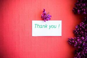 The beautiful lilac on a wooden background photo