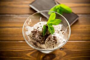 homemade ice cream with pieces of grated dark chocolate photo