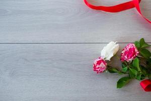 Floral background of pink, red and other roses photo