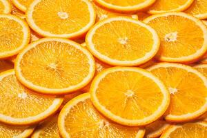 Colorful orange fruit slices photo