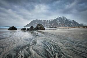 Rocky coast of fjord in Norway photo