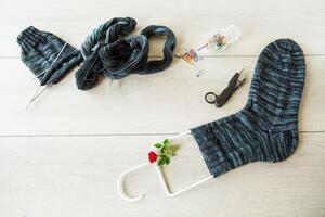 Set for hand knitting warm winter socks made of natural woolen yarn. photo