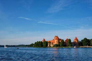 Trakai Island Castle in lake Galve, Lithuania photo