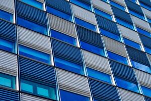 Modern building facade with widnows close up photo