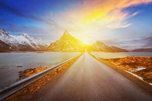 Road in Norway in fjord on sunset photo