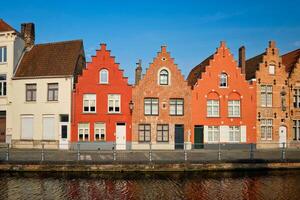Canal and old houses. Bruges Brugge , Belgium photo
