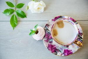 hot natural coffee with milk in a cup photo