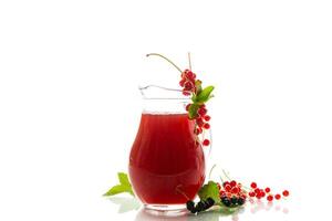fresh berry juice from red and black currant, on white background photo