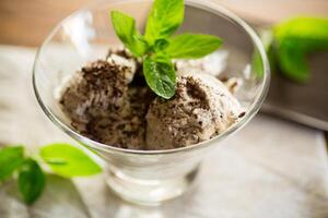 homemade ice cream with pieces of grated dark chocolate photo