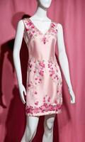 AI generated mini dress with low neckline on a mannequin. ai generative photo