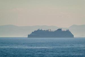 Cruise liner ship in Mediterranea sea photo