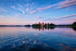 Trakai Island Castle in lake Galve, Lithuania photo