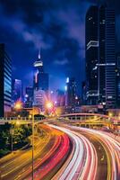 Street traffic in Hong Kong at night photo