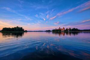 Trakai Island Castle in lake Galve, Lithuania photo