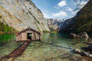 Boat shed on Obersee lake. Bavaria, Germany photo