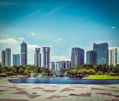 Vintage retro hipster style travel image of skyline of Central B photo