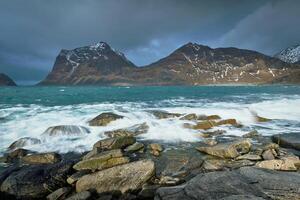 Rocky coast of fjord in Norway photo