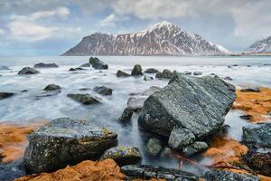 Rocky coast of fjord in Norway photo