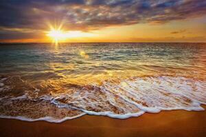 Calm ocean during tropical sunrise photo