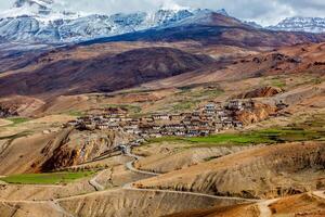 Kibber village high in Himalayas. Spiti Valley, Himachal Pradesh, India photo