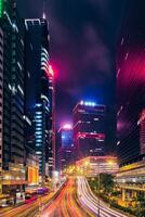 Street traffic in Hong Kong at night photo